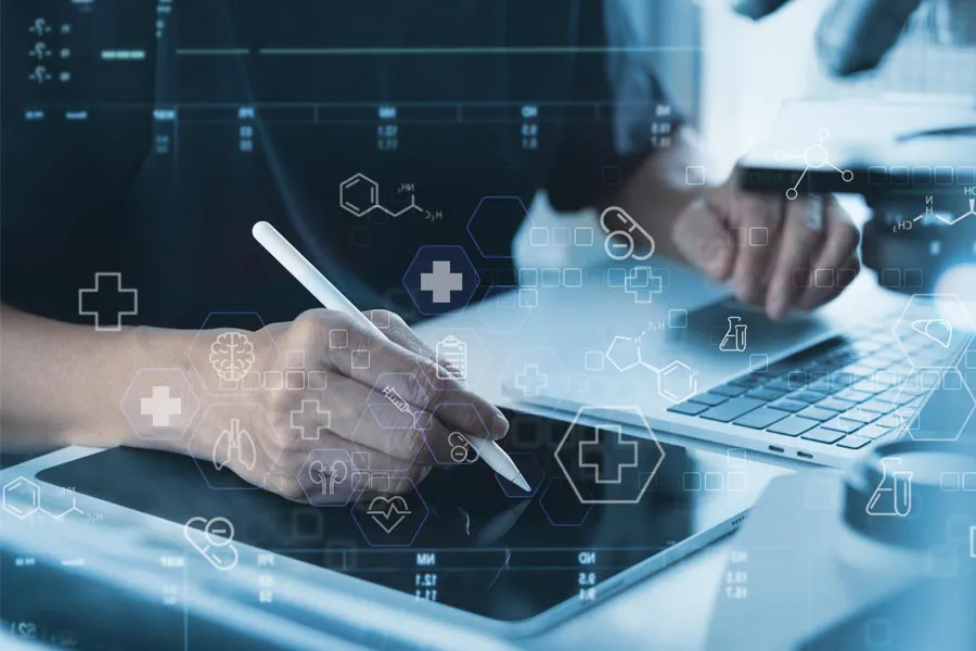 Health-Conditions-Treated-Doctor Close-up of a medical professional using a laptop and tablet, with illustrated medical symbols overlayed on the image, symbolizing health conditions treated by Fonthealth in Niagara.