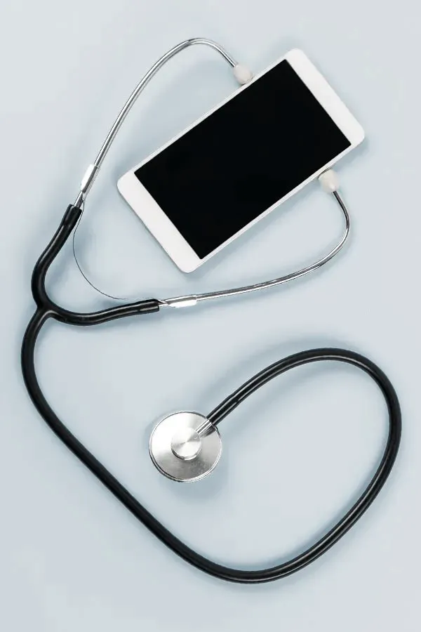 Telemedicine-Treatment A smartphone with a stethoscope attached to it, symbolizing Telemedicine treatment from Fonthealth in Niagara.